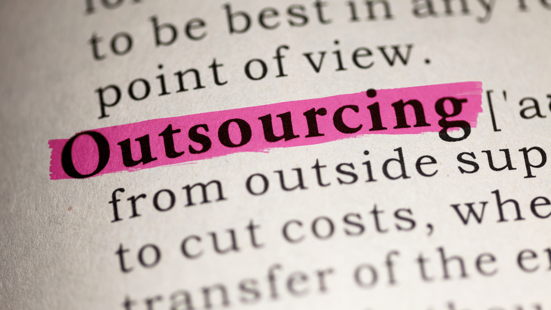 The Word Outsourcing Shown From A Page Of A Dictionary To Help Find The Meaning